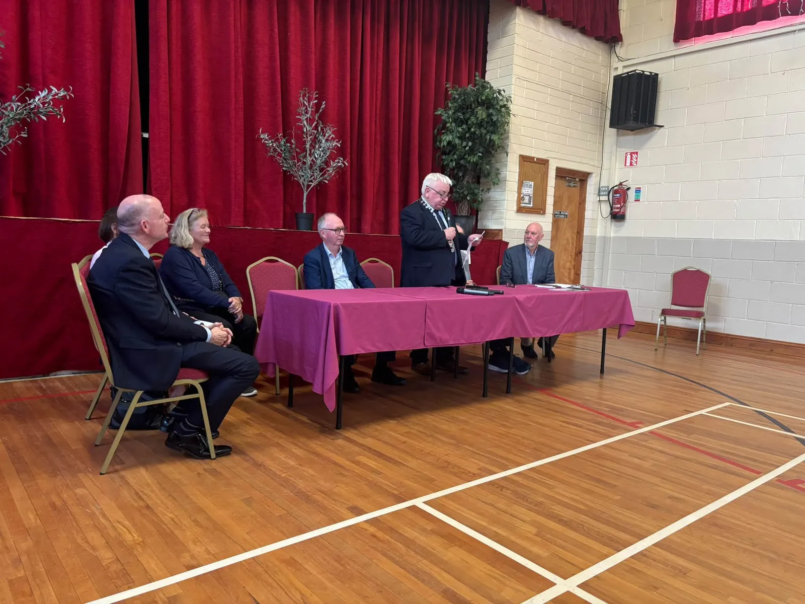 The presentation panel at a table in the Main Hall